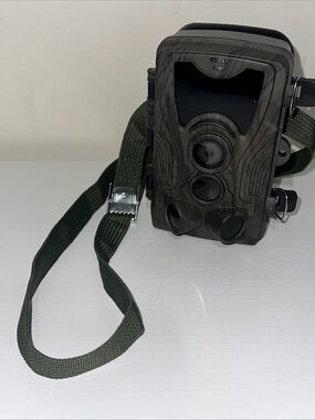 Source Unknown Camouflage Trail Camera with Dark Green Strap
